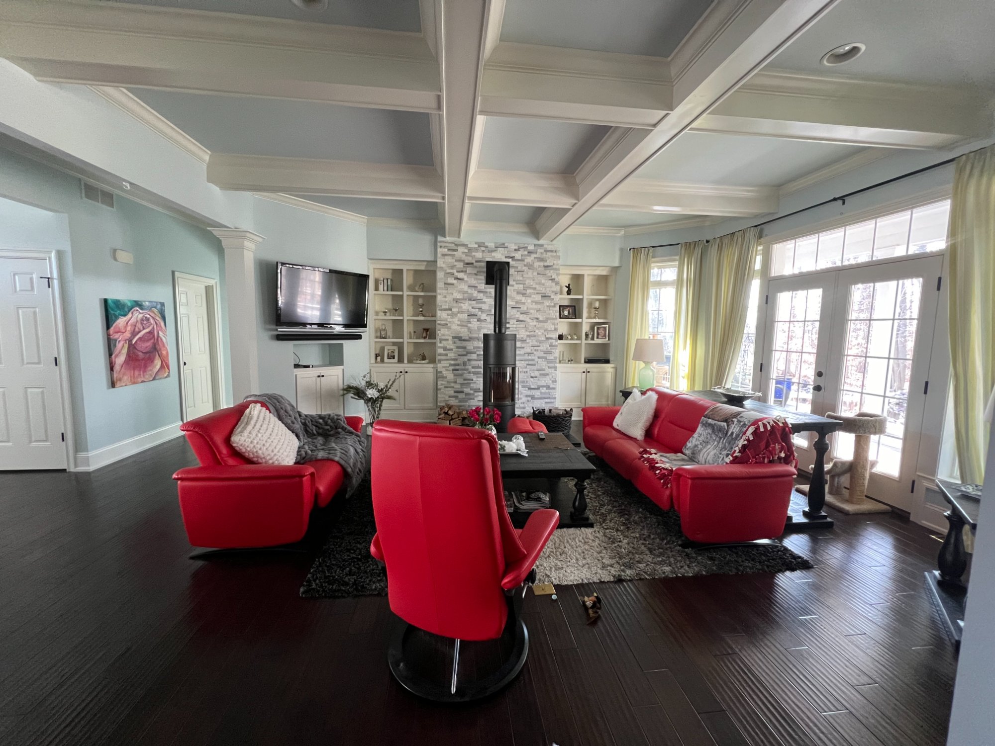 Interior painting project - luxury living room with coffered ceiling and painted built-ins in Manitowoc